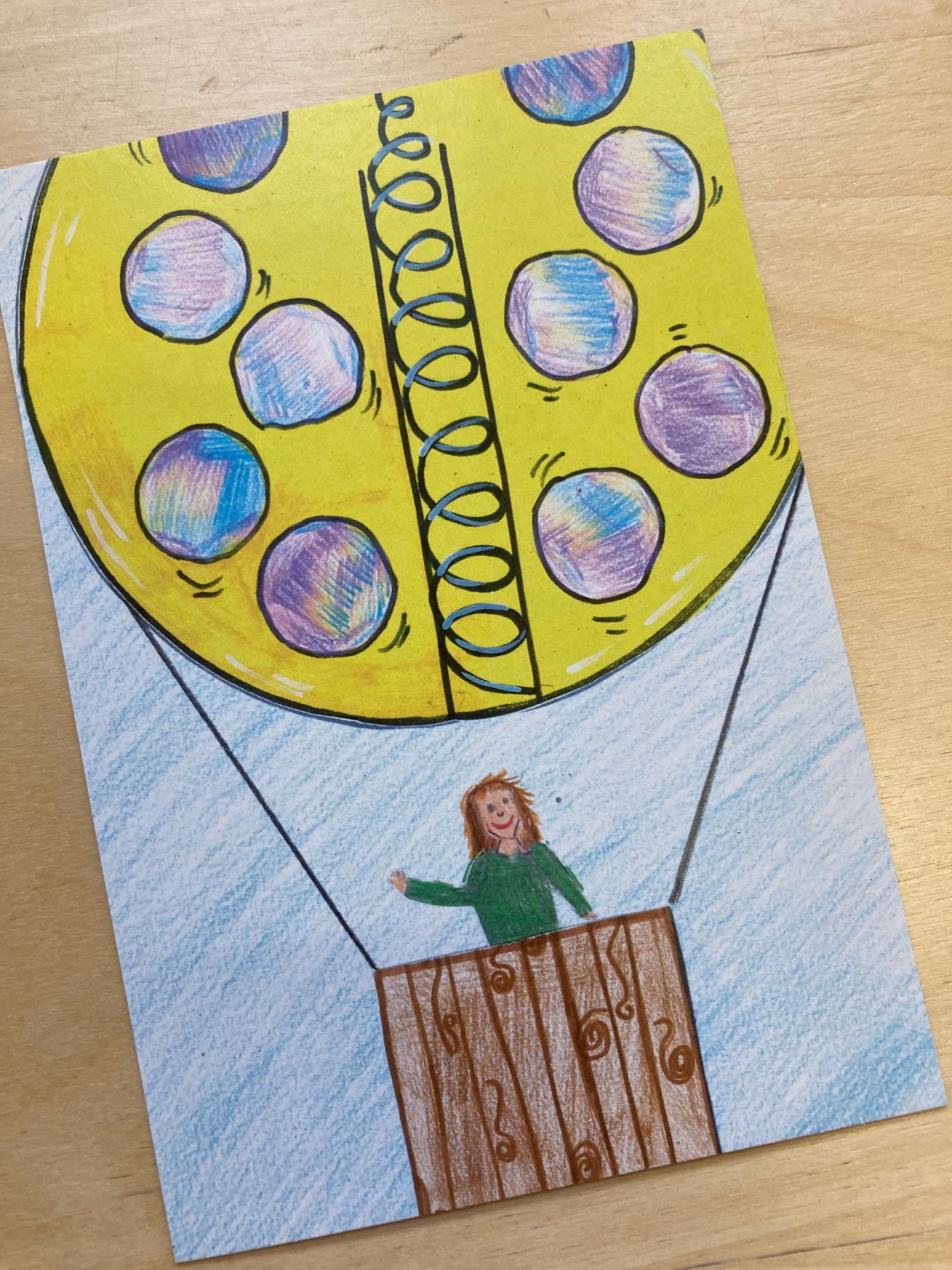 Die Volksschulkinder in Obertilliach haben ihre Ideen f&uuml;r eine nachhaltige Mobilit&auml;t gemalt, die Motive wurden als Postkarten aufgelegt. Hier das Bild von Selina Ganner